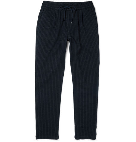 tapered pinstriped virgin wool and cotton blend trousers