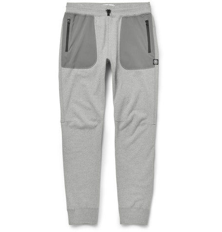 tapered cotton jersey and stretch shell sweatpants